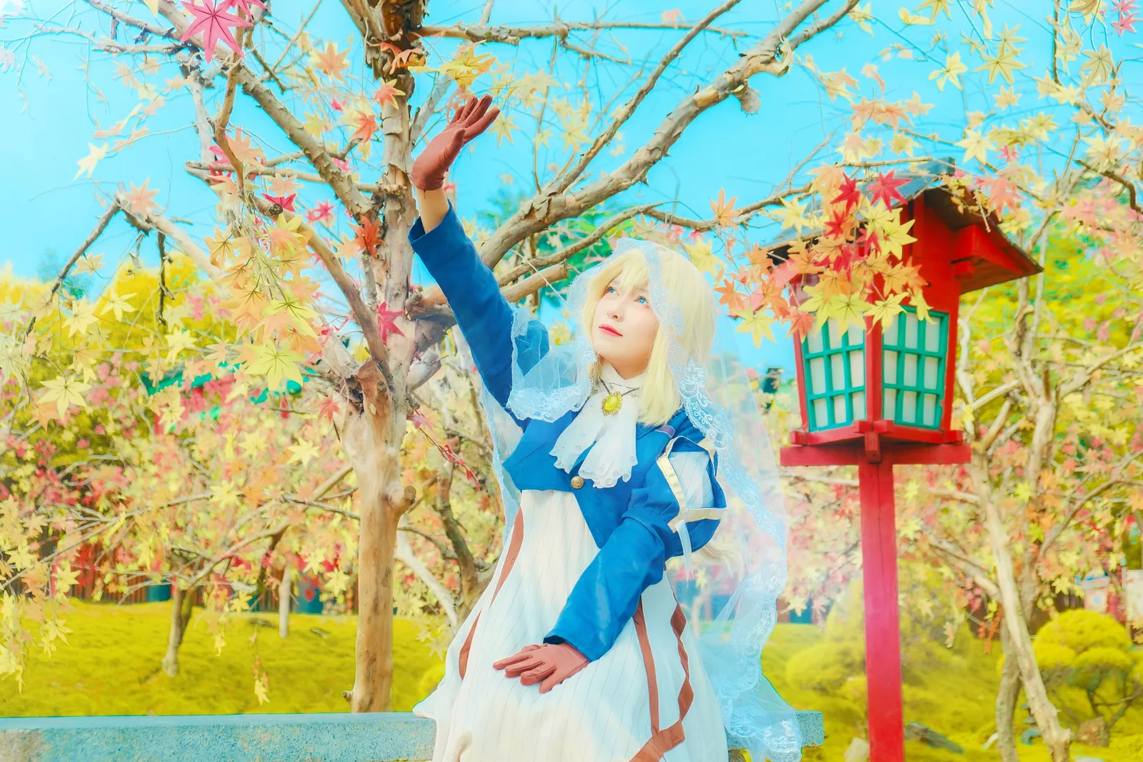 Violet cosplay among colorful autumn leaves