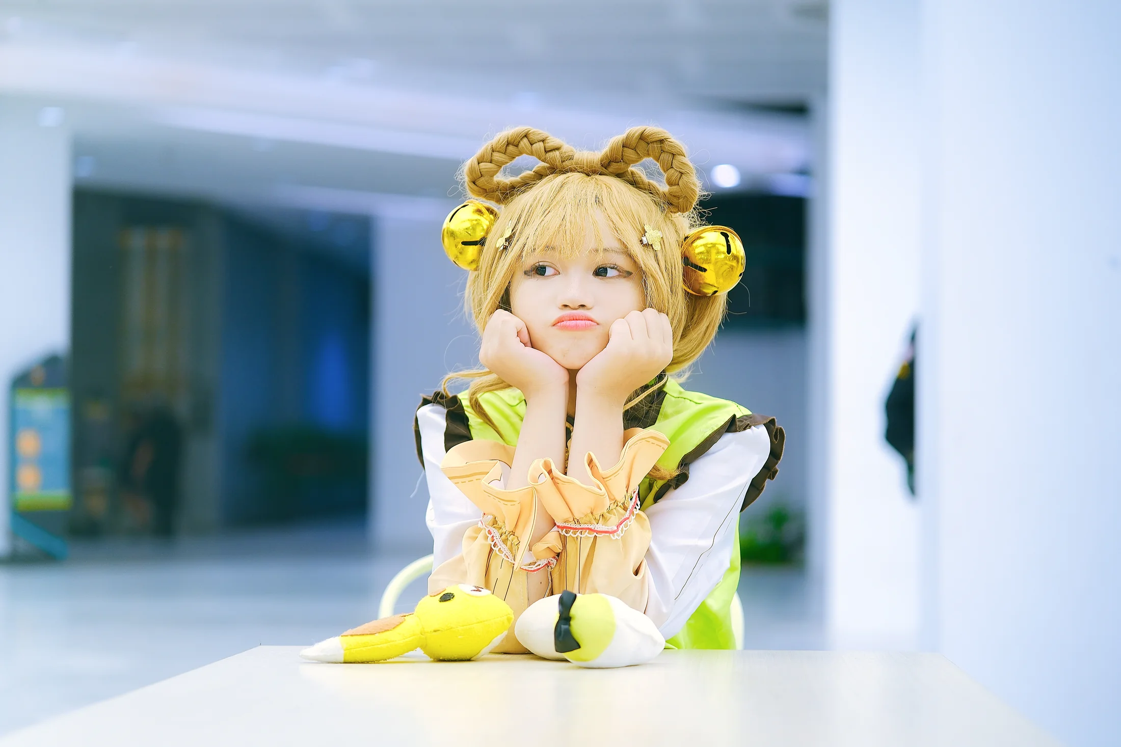 Yaoyao cosplay portrait across a white table