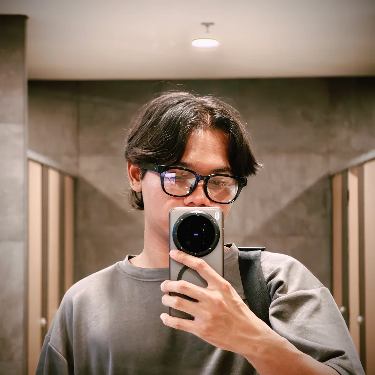 Nayota, Lowkeyiki player two photographer, taking a mirror selfie