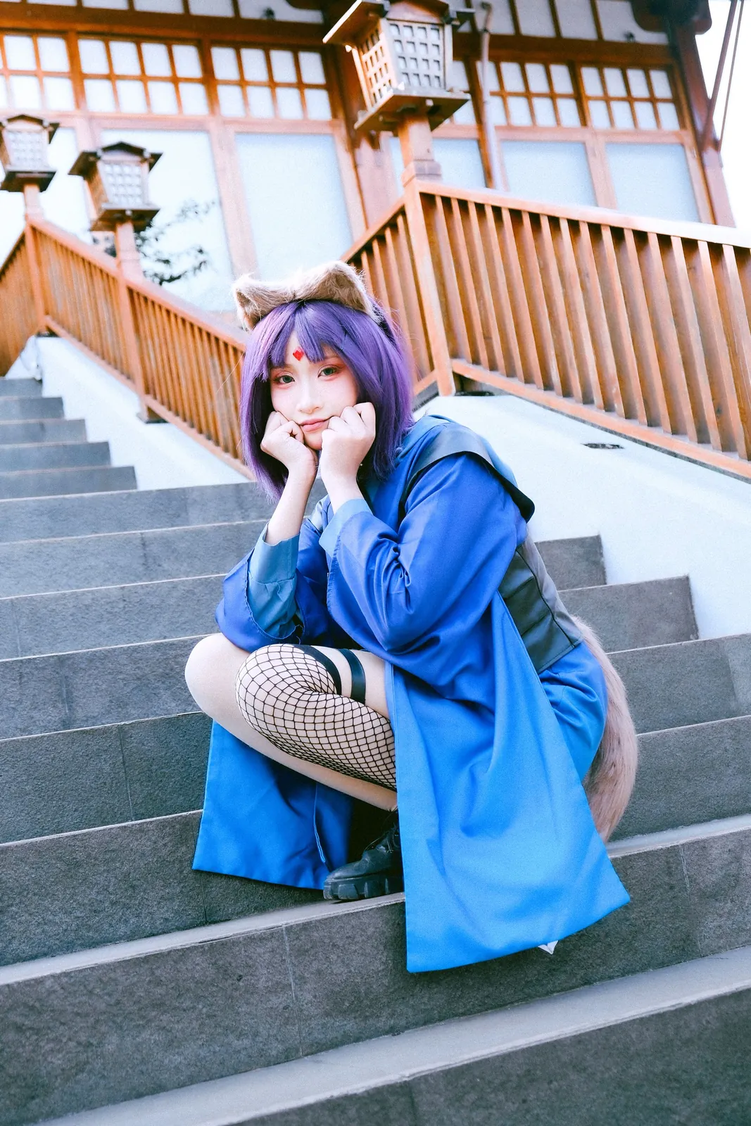 Iroha cosplay portrait seated on temple steps
